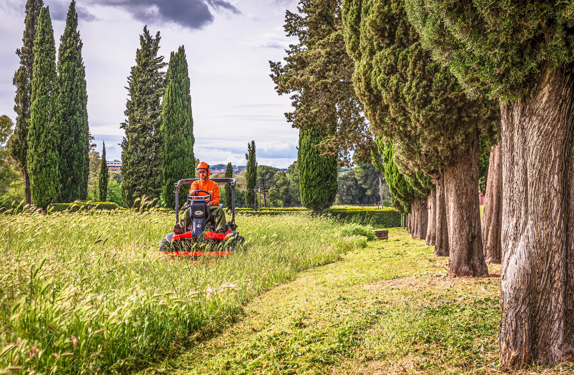 Professional lawn maintenance on a large local property